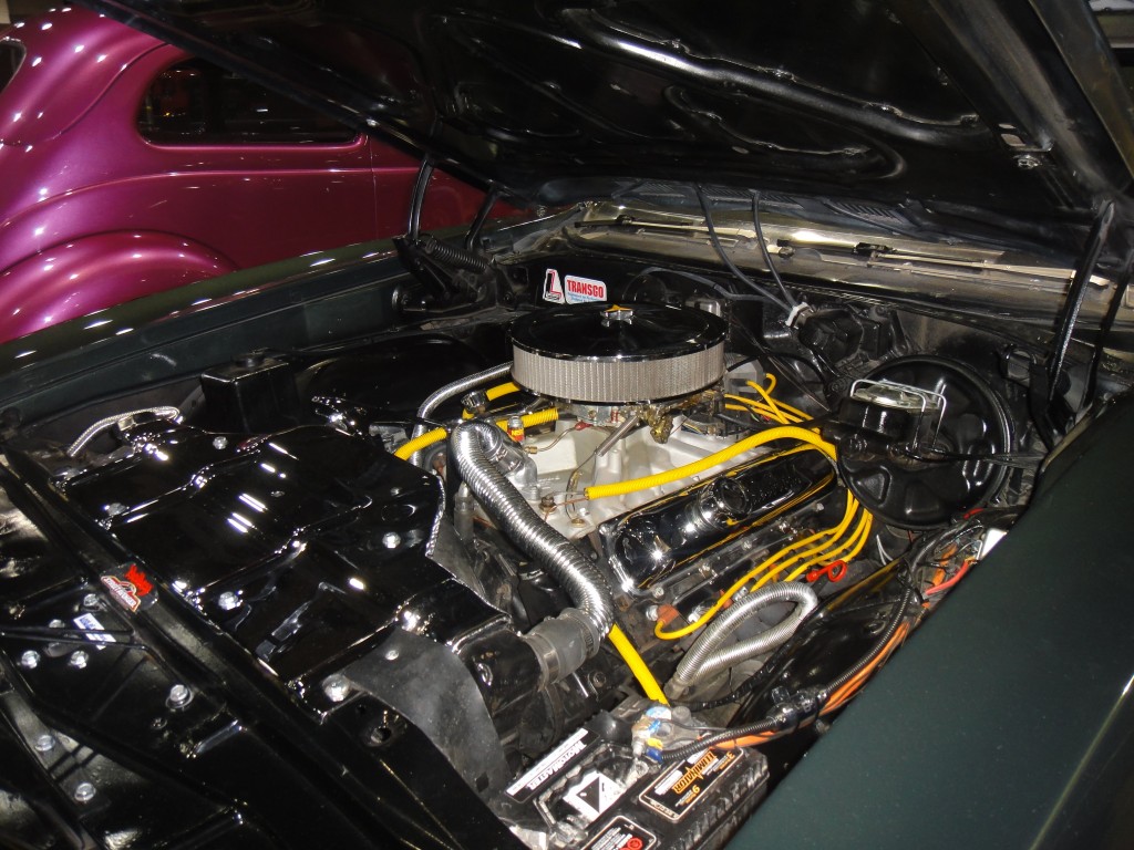 small block chevy v8 engine in a muscle car