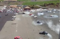 Cars Performing Simultaneous Burnouts