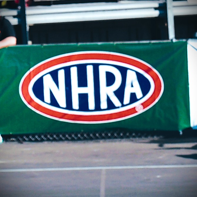 nhra logo on green banner