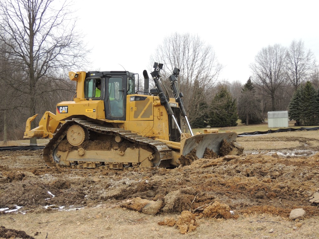 Bulldozer moving dirt at a jobsite