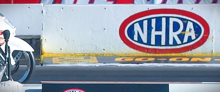 nhra logo on a barrier wall