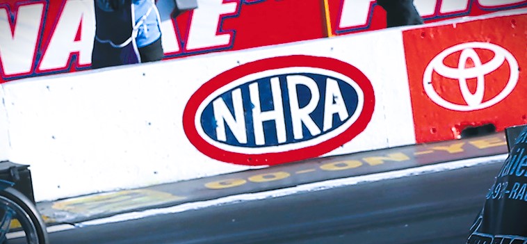 close up of nhra logo on a barrier wall