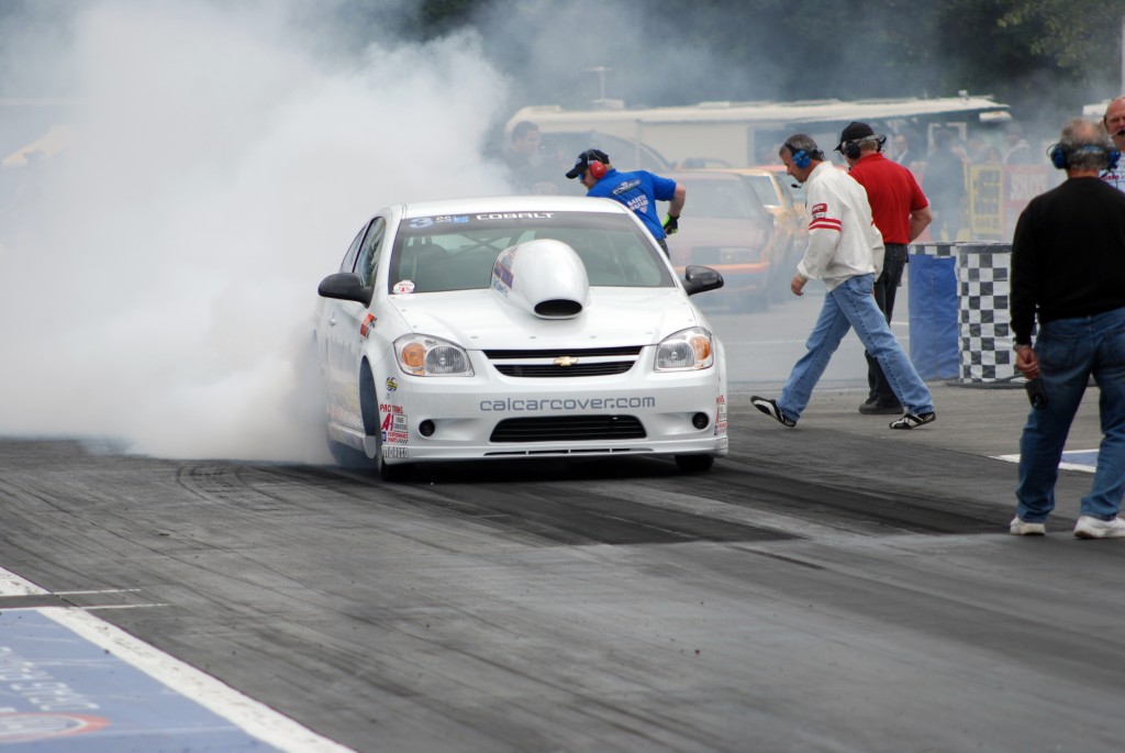 Chevy Cobalt drag car doing a burnout