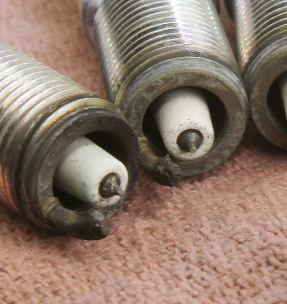 spark plugs with damaged electrodes