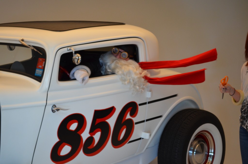 santa claus during a hot rod themed photo shoot