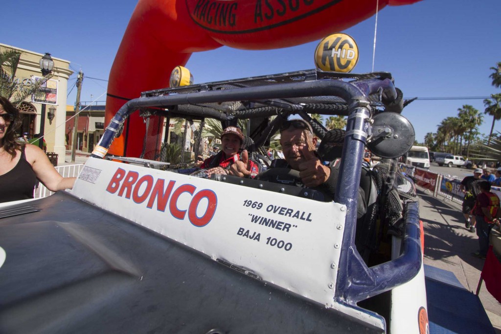 folks riding in baja bronco