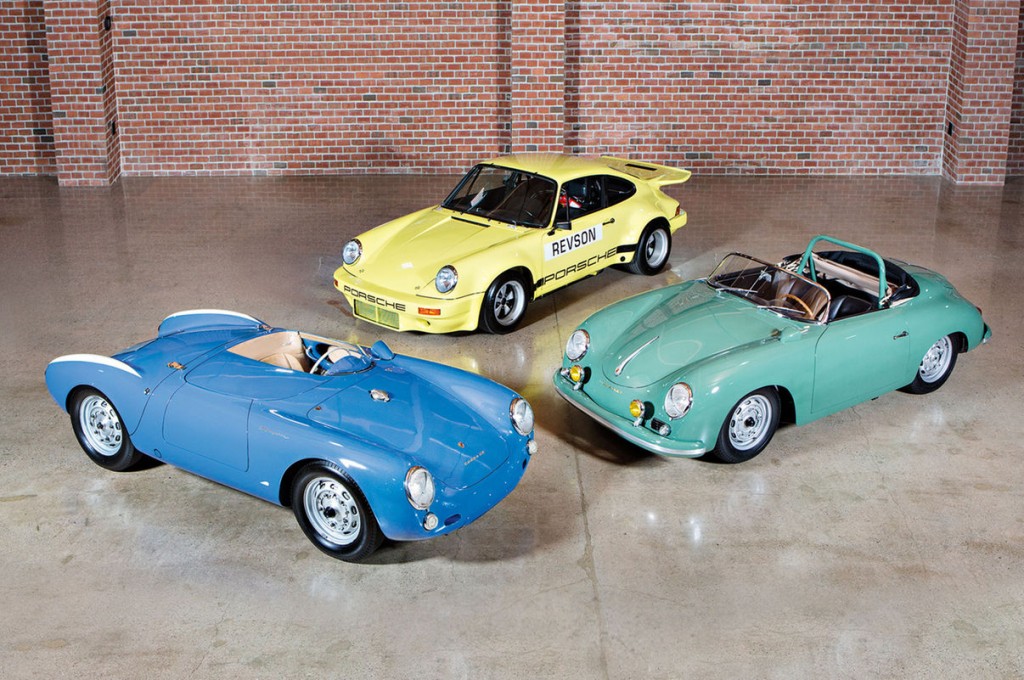 group of classic Porsches in garage