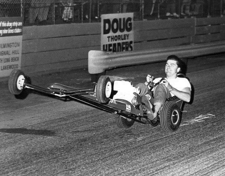 Mickey Thompson doing a wheelie in a mini dragster