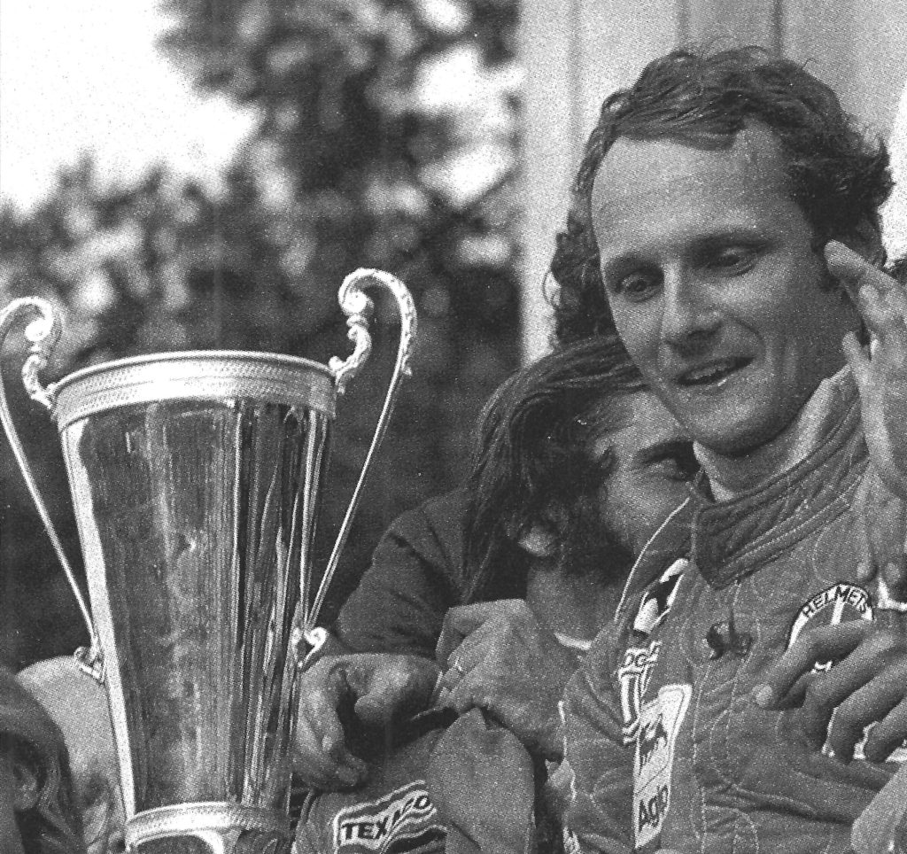 Niki Lauda with trophy after a race