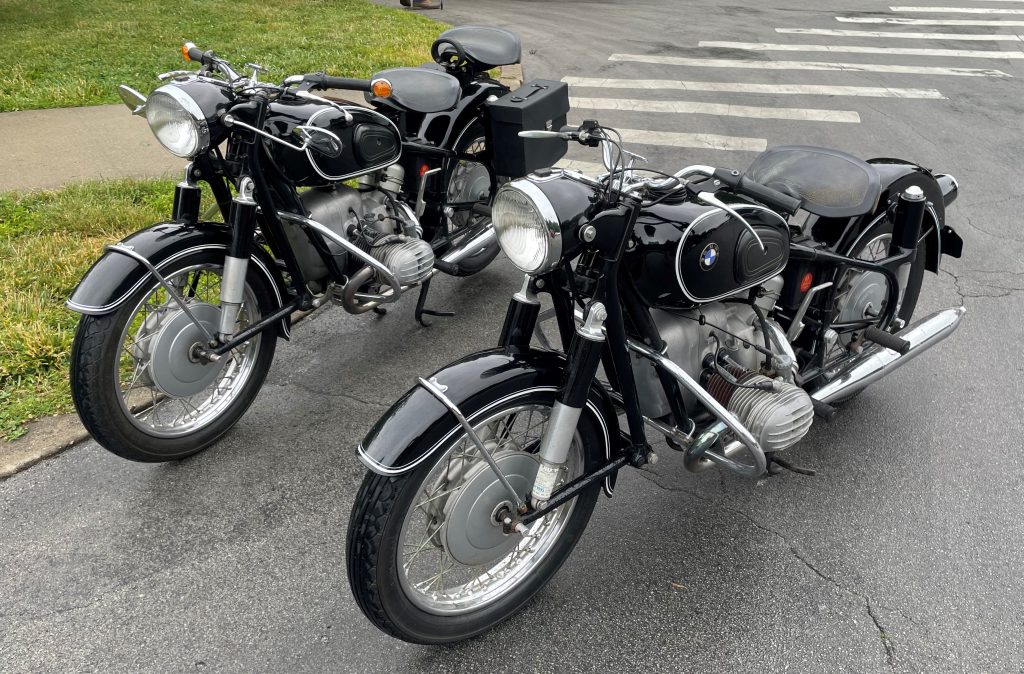 a pair of vintage bmw r60 motorcycles