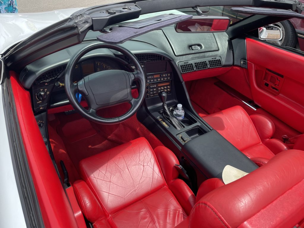 red interior shot of a c4 chevy corvette convertible