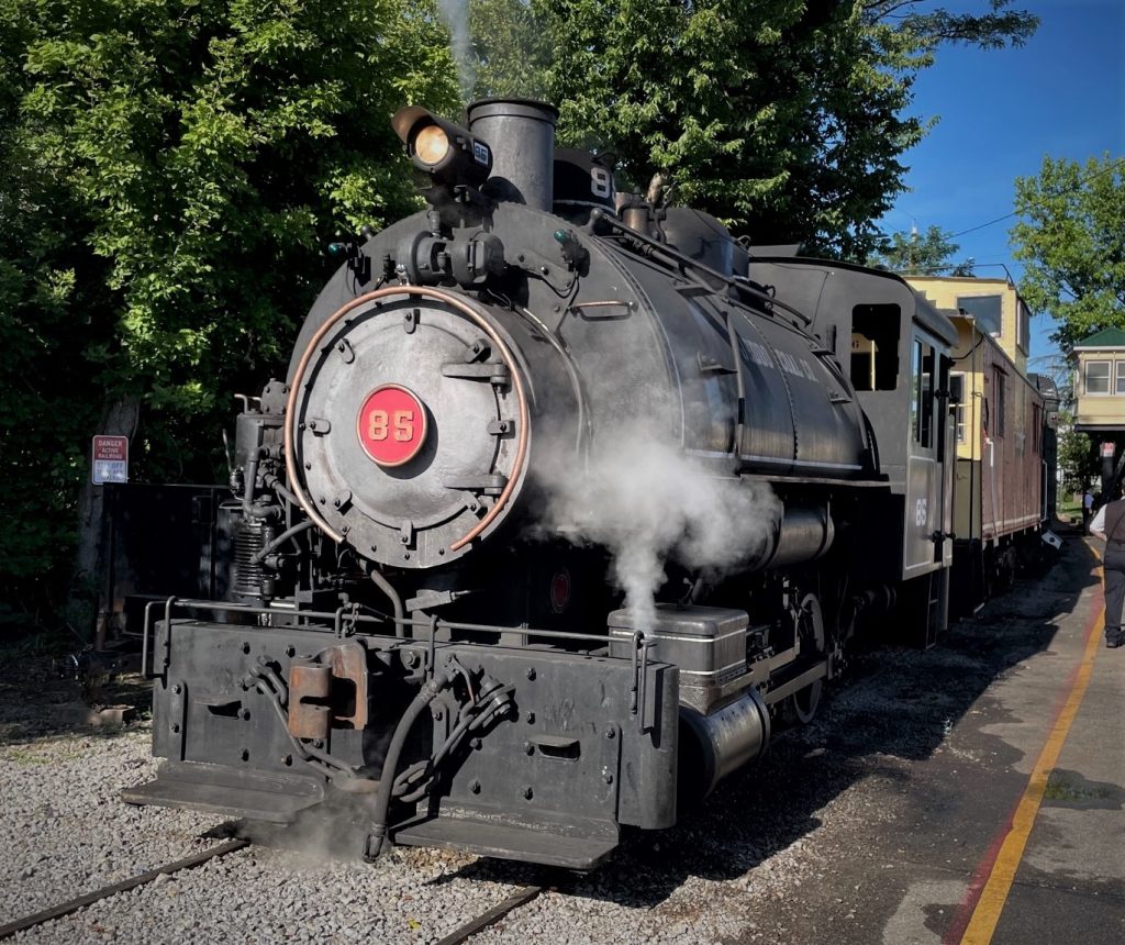 vintage 85 tank steam engine on railroad track
