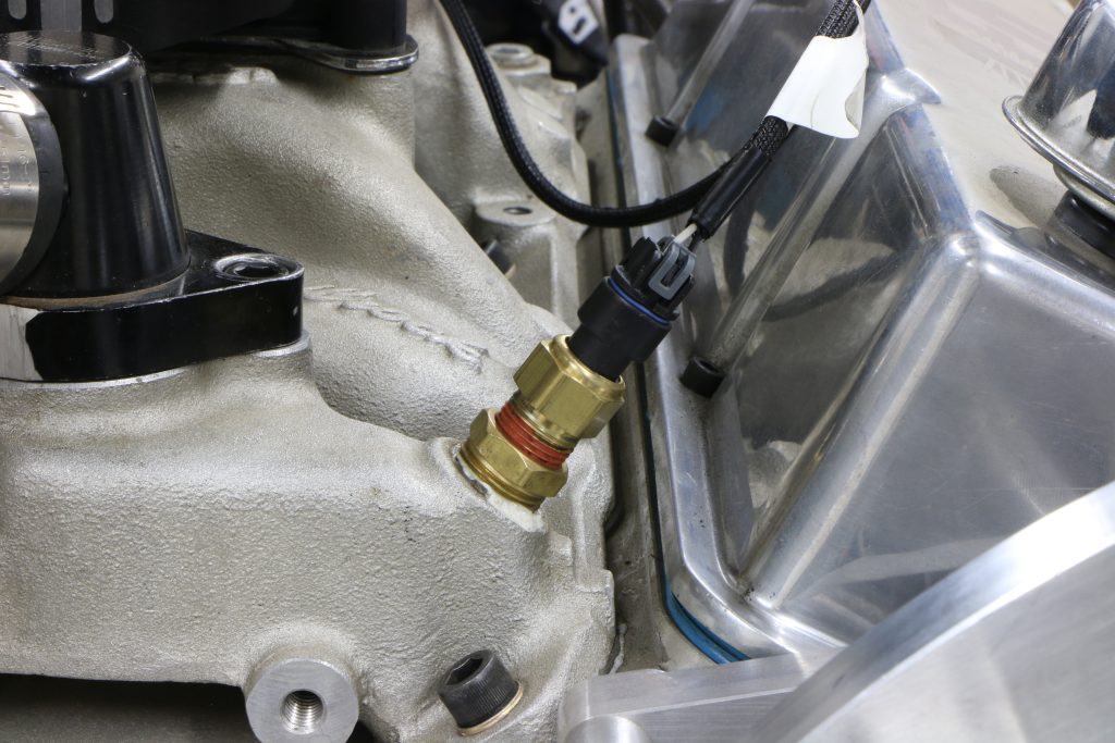 fitting sensor onto an intake manifold
