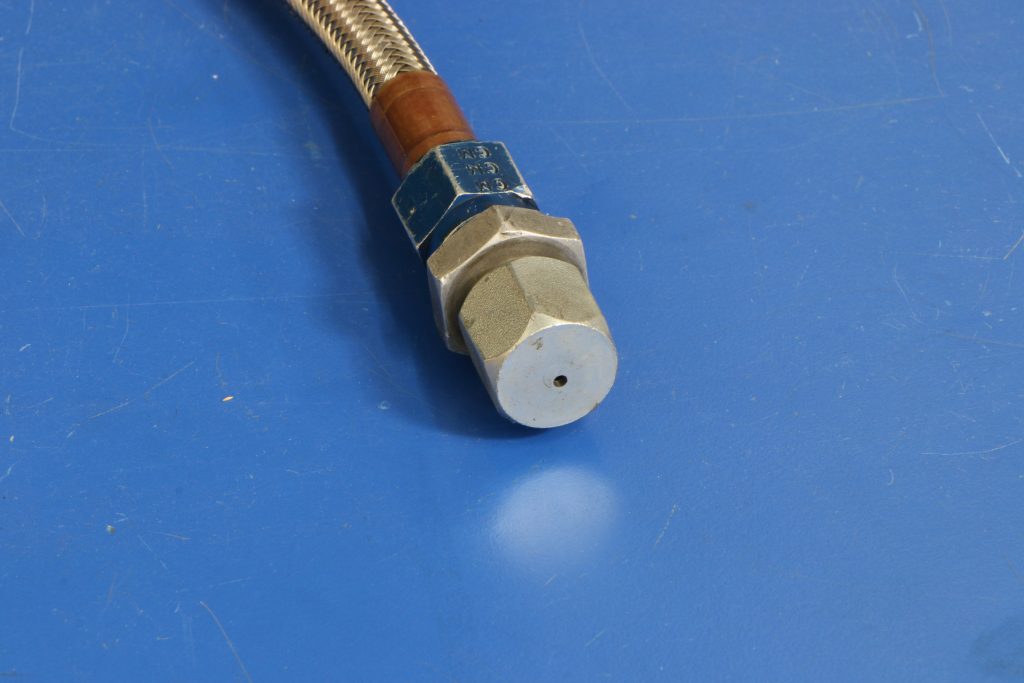 plug cap on a nitrous line fitting