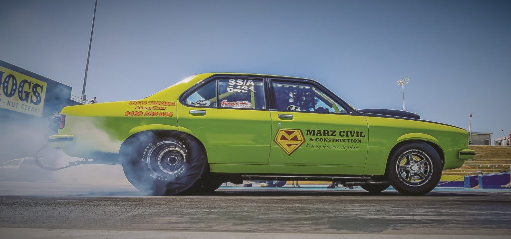 Australian four door muslce car on dragstrip