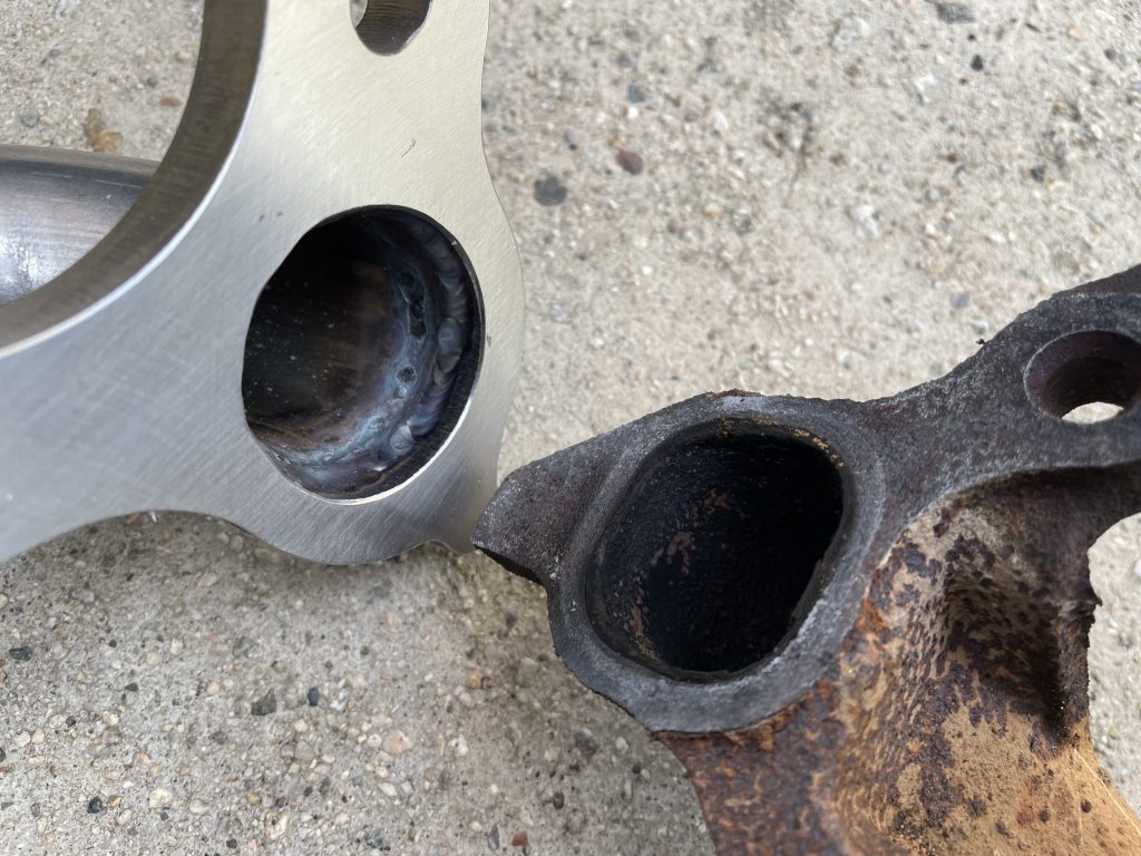 port comparison between old and new exhaust manifold