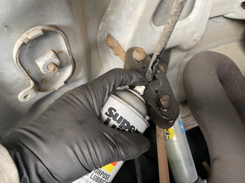 using spray lubricant on a rubber exhaust hanger
