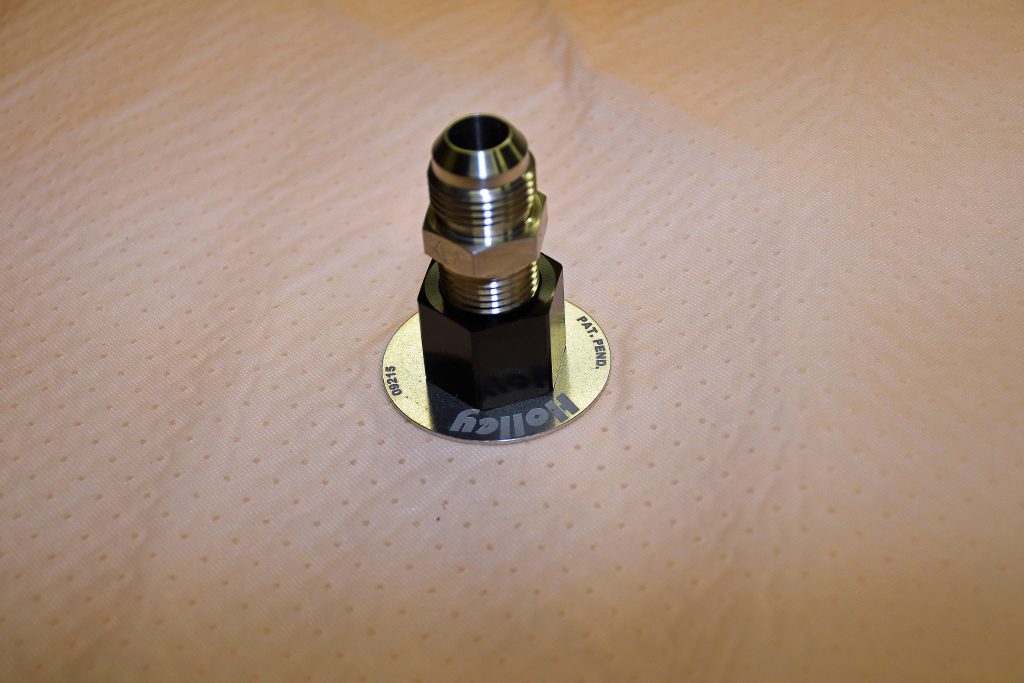 10AN to 1/2-inch NPT adapter fitting in a Holley HydraMat
