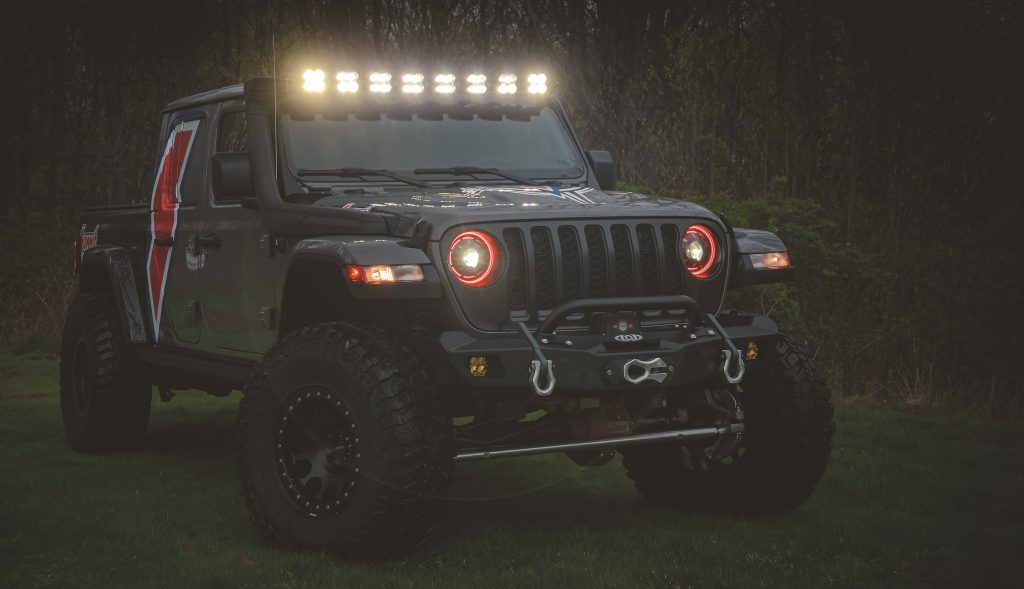 2023 Jeep Gladiator truck at night with off-road lights