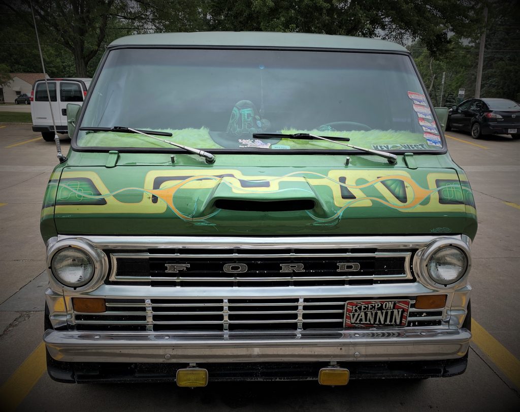 front end view of hood scoop on a custom 1974 Ford Econoline van