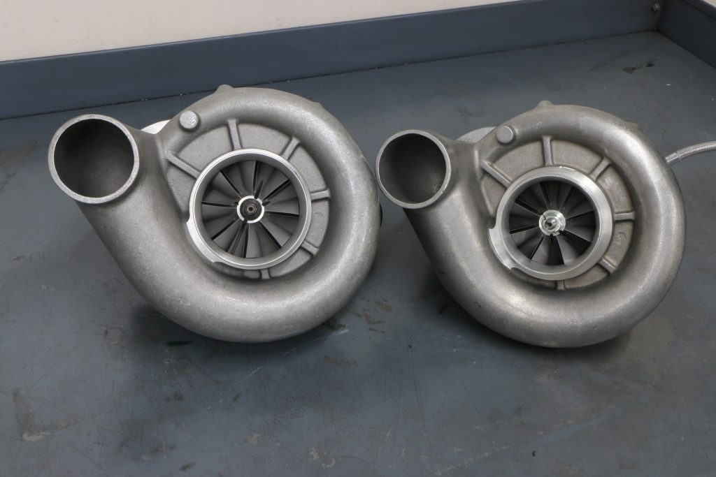 a pair of centrifugal superchargers on a table