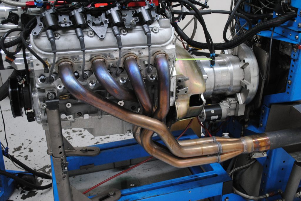 close up of headers on an ls engine during dyno test run