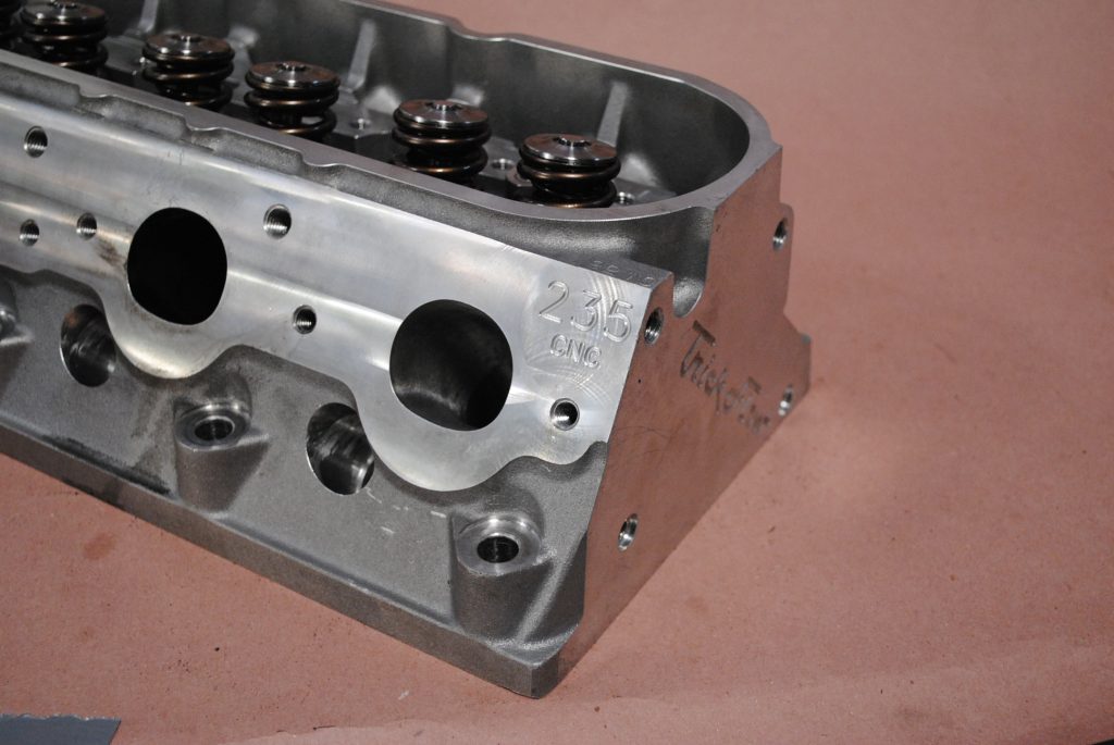 trick flow 235 cylinder head on workbench