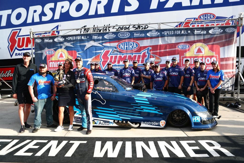 bob tasca III In NHRA Winners Circle with funny car