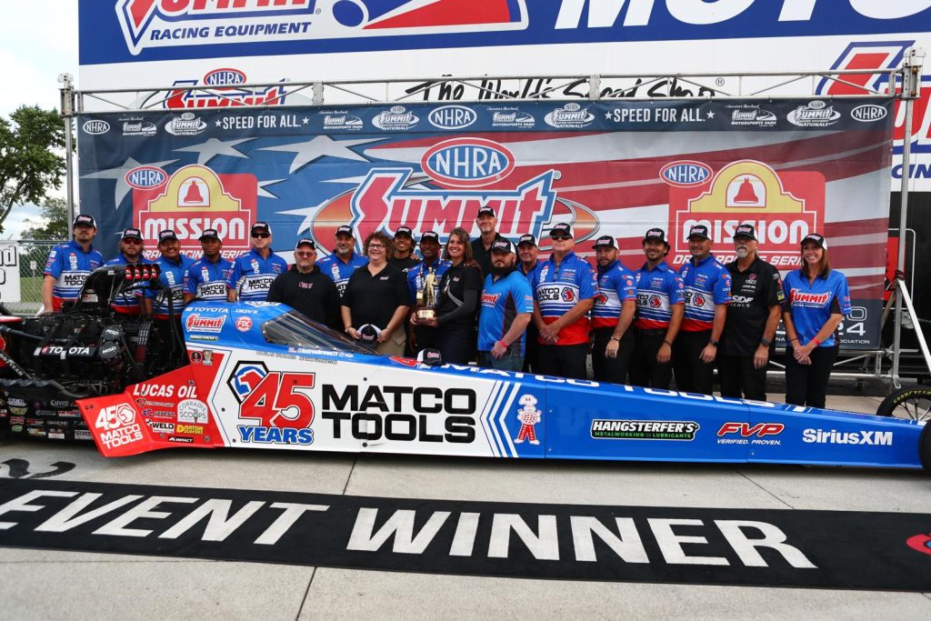 Top Fuel Driver Antron Brown in NHRA Winner's circle