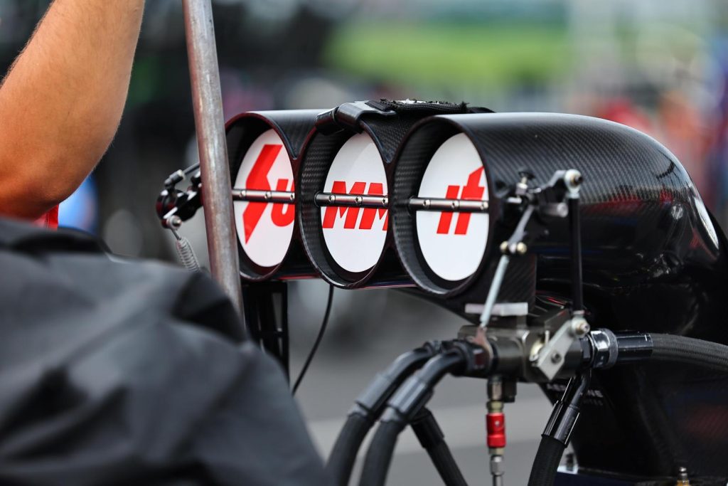 Summit Racing logo on top fuel dragster engine butterflies