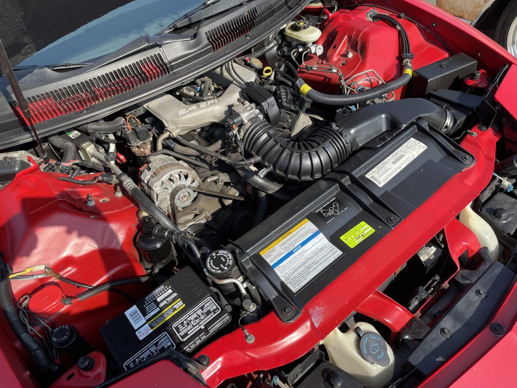 3.4L V6 under the hood of a 4th-gen chevy camaro