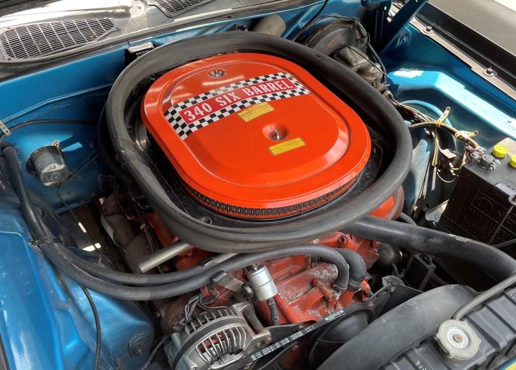 340 six barrel TA V8 engine in a 1970 plymouth aar cuda