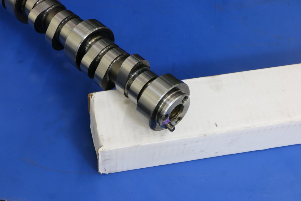 camshaft resting on a white box