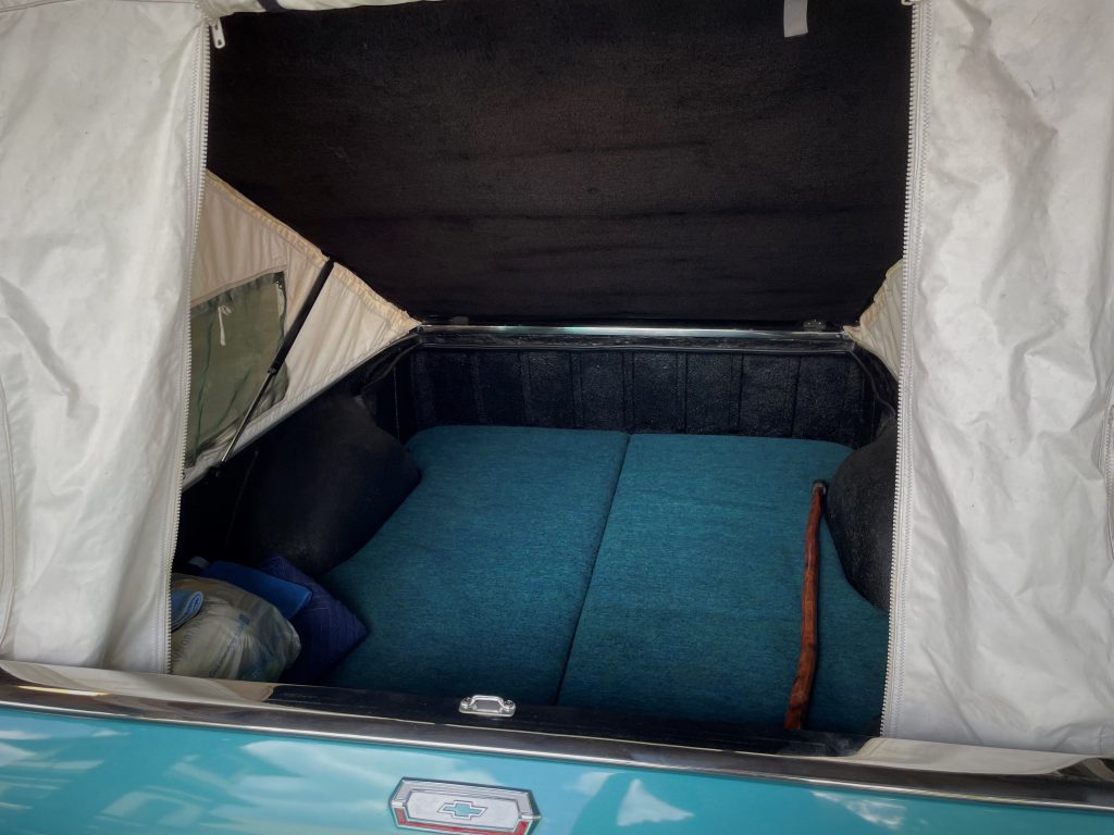 bed of 1968 Chevy El Camino with custom camper tent