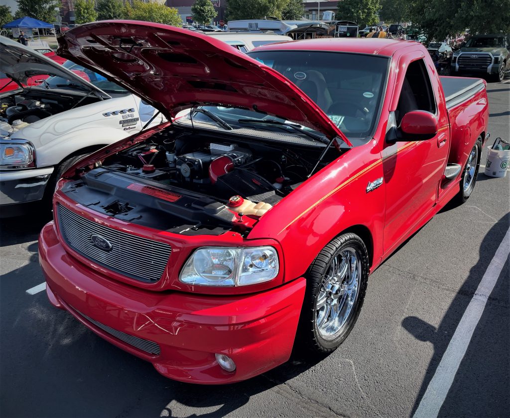 Red Ford F-150 Lightning SVT truck