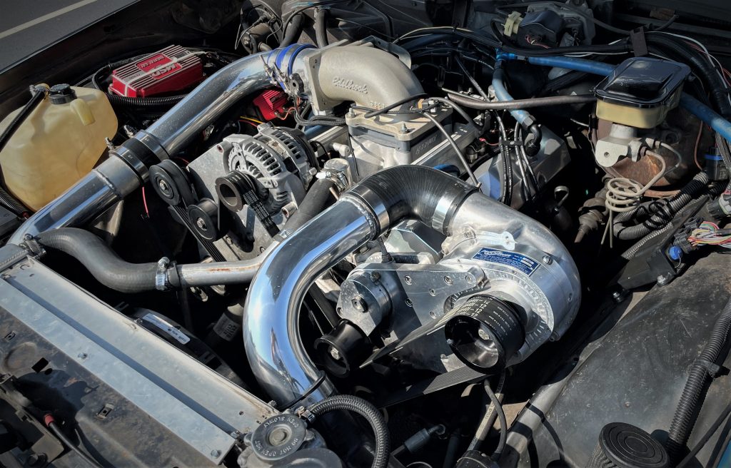 Blow-through supercharger on a carbureted chevy v8