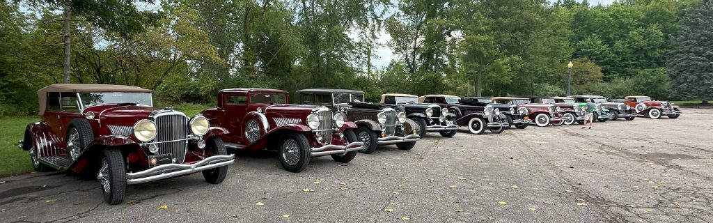 line of vintage Duesenberg luxury cars