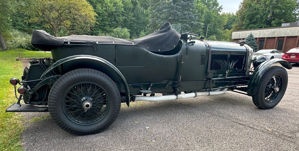 side profile shot of a racing Duesenberg