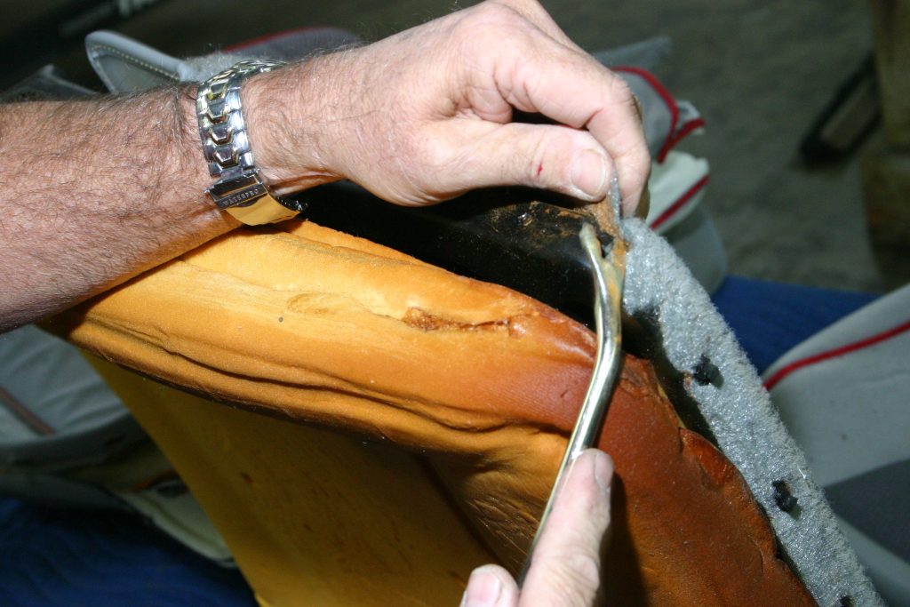 Removing more plastic rivets from 1985 Mustang rear seat back