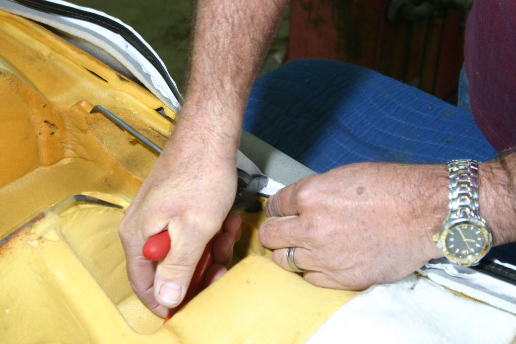 Install hog rings on 1985 Mustang rear seat bottom