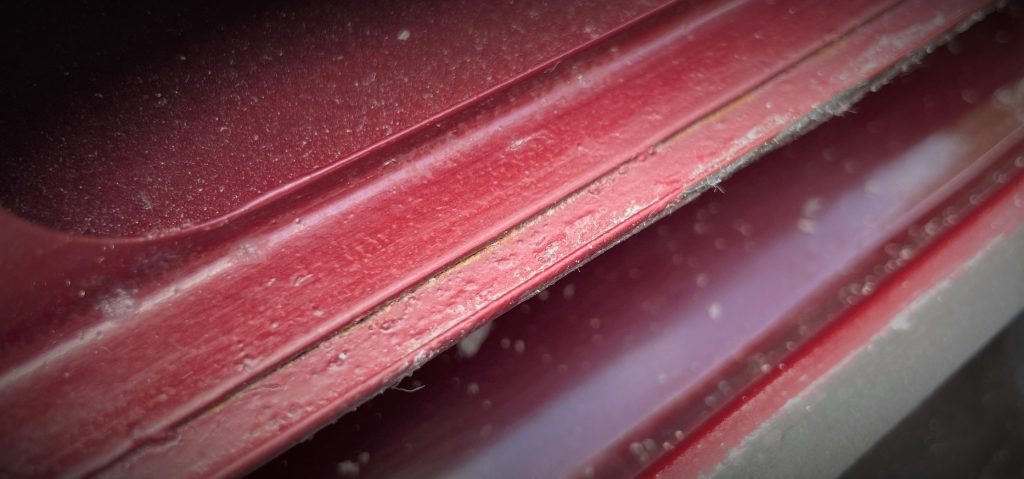 Close up of small rust evidence on metal surface