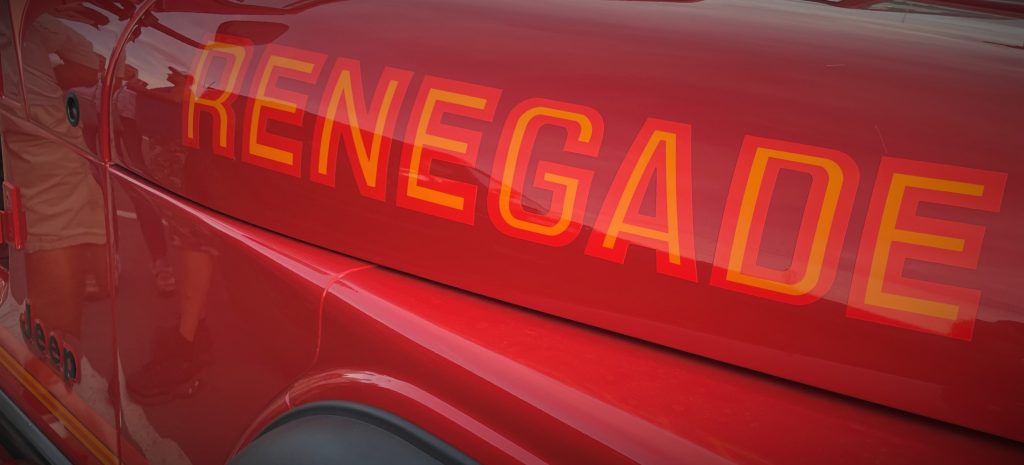 close up of renegade decal on a jeep cj hood