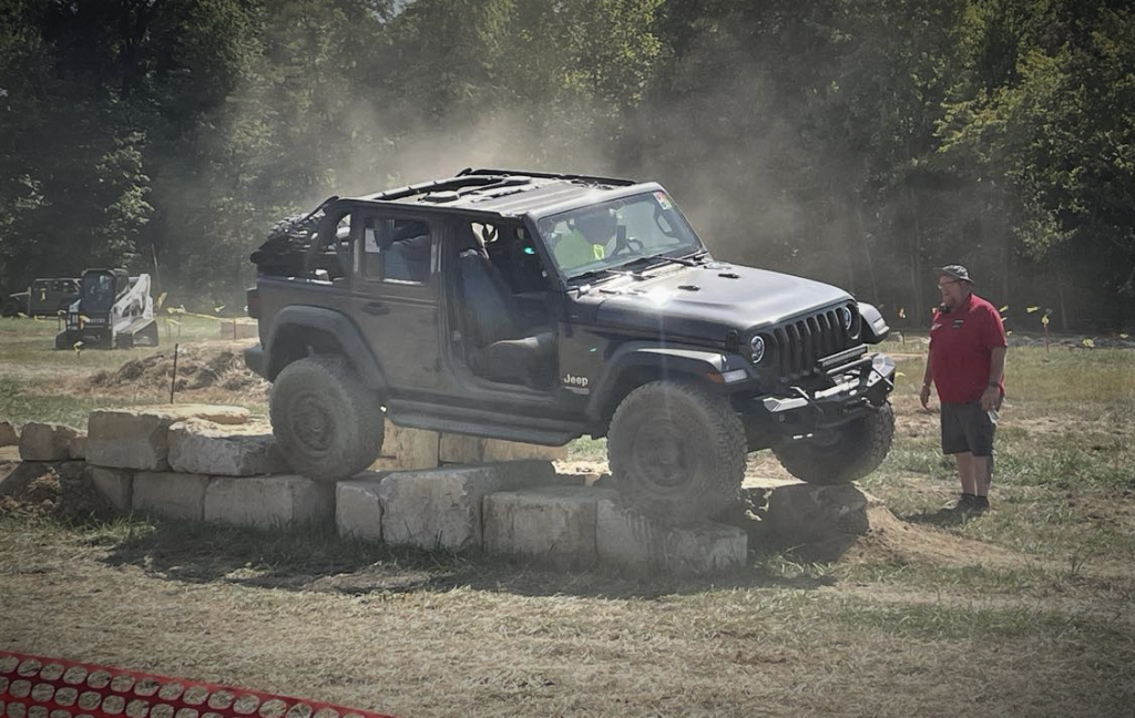 Jeep JL Wrangler on an off-road course