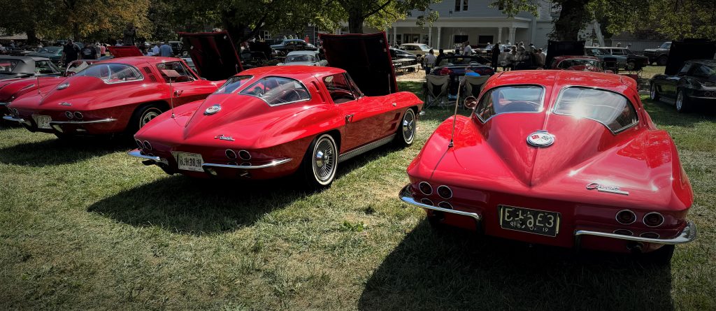 Rear view of a pair of C2 Corvette Split Window Sting Ray coupes