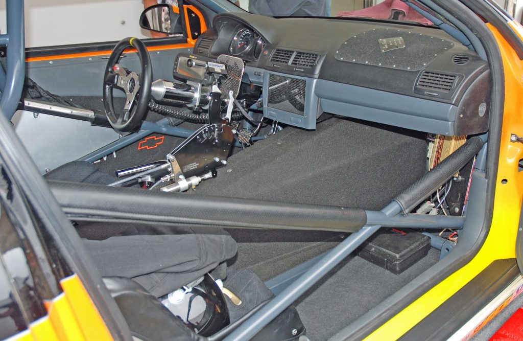 Drag race car interior and roll cage