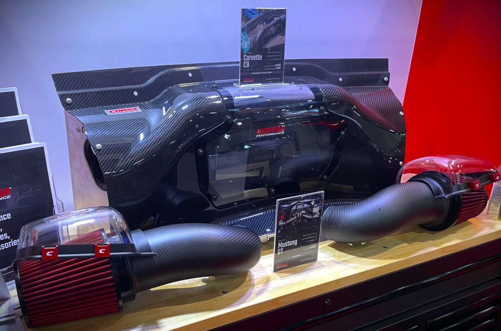 a pair of cold air intakes in a trade show display