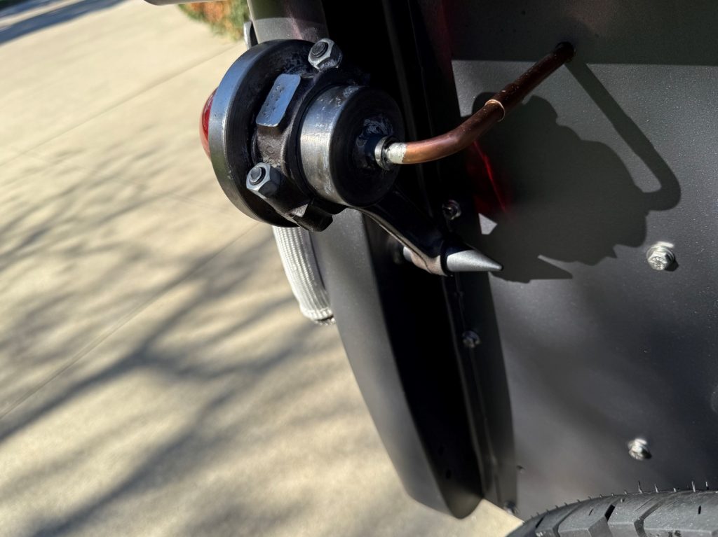 rear connecting rod tail lamp mount on a prewar rat rod