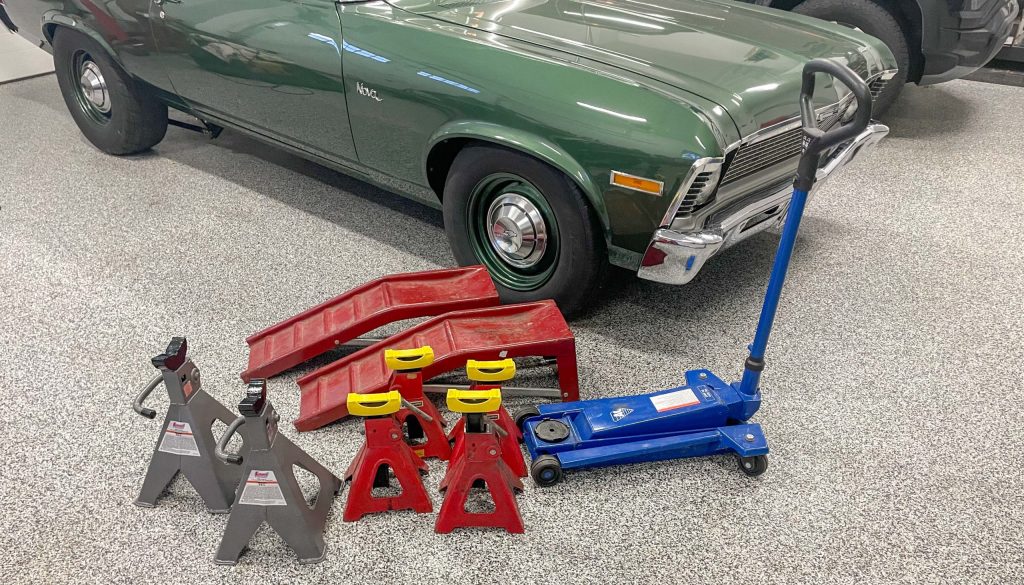 Jack, jack stands, and ramps to lift a Chevy Nova