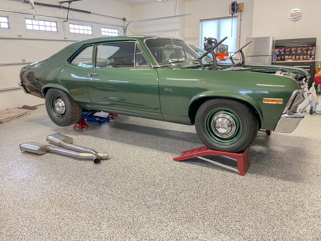 Chevy Nova on jack stands and ramps