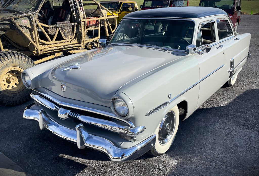 Vintage White Ford Customline Sedan